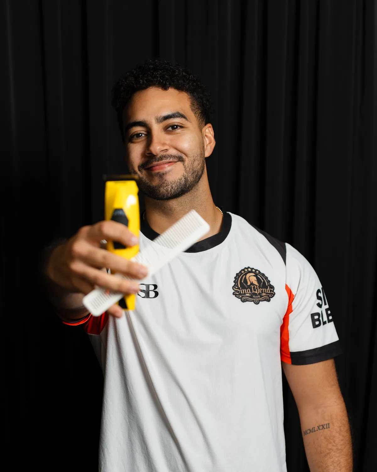 Juan, barber at Sina Blendz Barbershop in Southbank, Melbourne